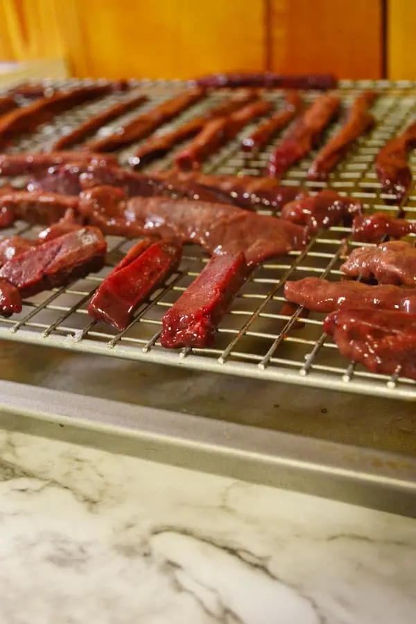 Liver Jerky Dog Treats on baking rack before being cooked