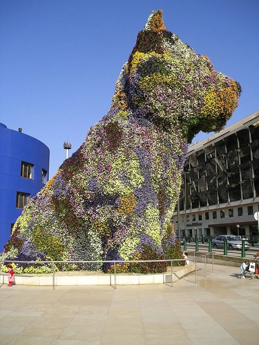 Known by dog devotees for his dog balloon sculptures, artist Jeff Koons created "Puppy," a Westie in the form of a floral sculpture, in 1992. 